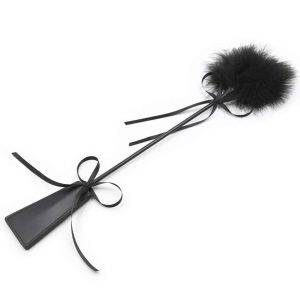 Unleash your desires with the Feather Lingerie Riding Crop, an essential addition to your collection of intimate accessories.