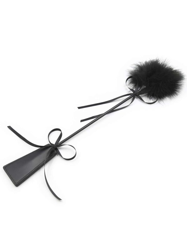 Unleash your desires with the Feather Lingerie Riding Crop, an essential addition to your collection of intimate accessories.