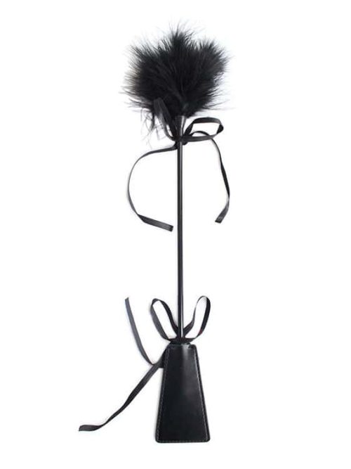 Unleash your desires with the Feather Lingerie Riding Crop, an essential addition to your collection of intimate accessories.
