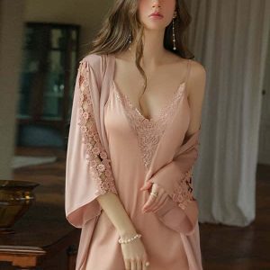 Indulge in unparalleled comfort and sophistication with our Lace Deep V Backless Camisole Robe Set.