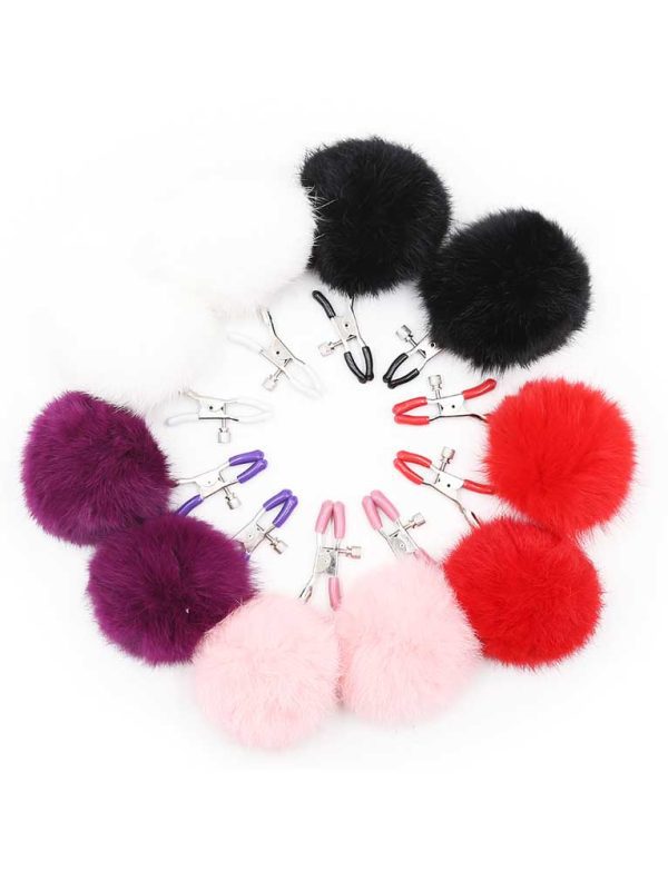 Fuzzy Ball Nipple Grips Elevate your sensual experiences with our Fuzzy Ball Nipple Grips, expertly crafted from luxurious feathers and featuring premium nickel-free hardware.