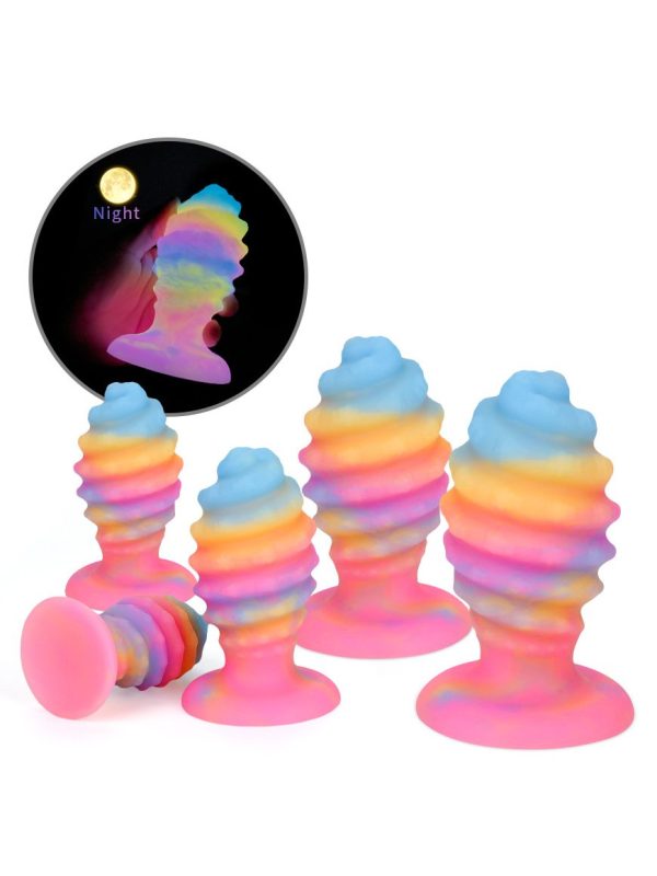 A glow-in-the-dark silicone anal plug, designed for safe and pleasurable use, with a smooth finish and a subtle light emitting feature