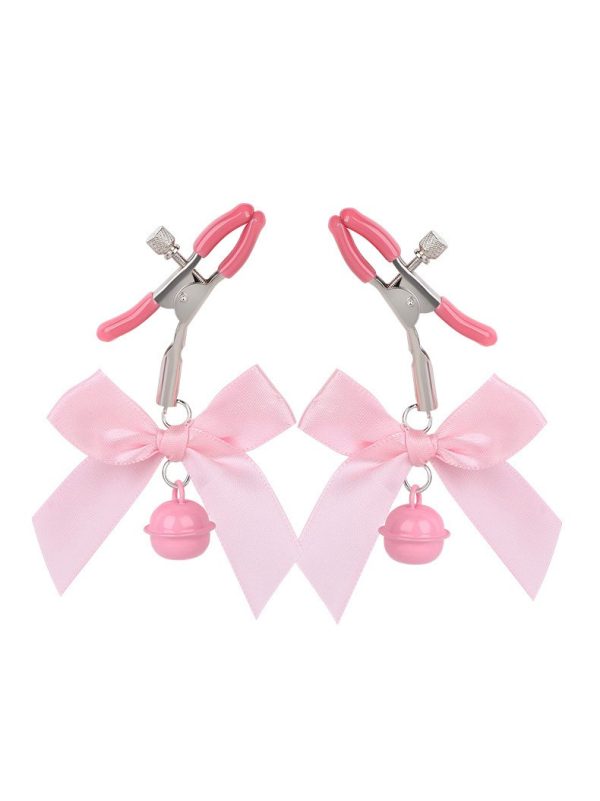 A pair of elegant nipple clips adorned with bows and bells, showcasing a stylish and playful design.