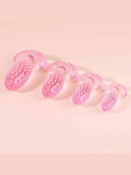 Transparent anal plug shaped like a pineapple, combining a playful design with smooth contours for a unique and enjoyable experience