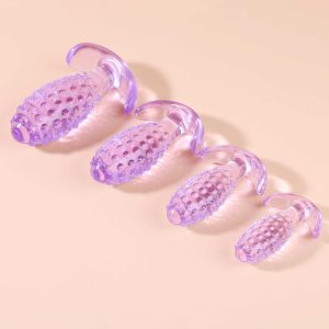 Transparent anal plug shaped like a pineapple, combining a playful design with smooth contours for a unique and enjoyable experience