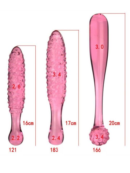A pink transparent dildo, designed with a smooth surface and realistic contours for a pleasurable experience