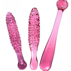 A pink transparent dildo, designed with a smooth surface and realistic contours for a pleasurable experience