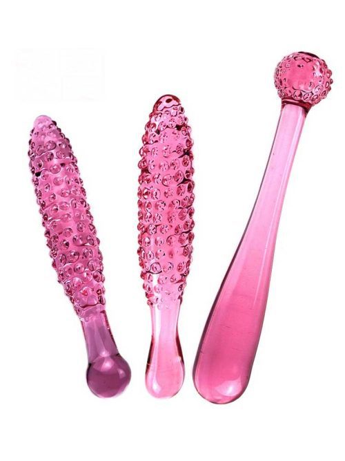A pink transparent dildo, designed with a smooth surface and realistic contours for a pleasurable experience