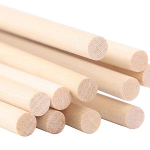 A bamboo whip with a black handle, showcasing its sleek design and craftsmanship