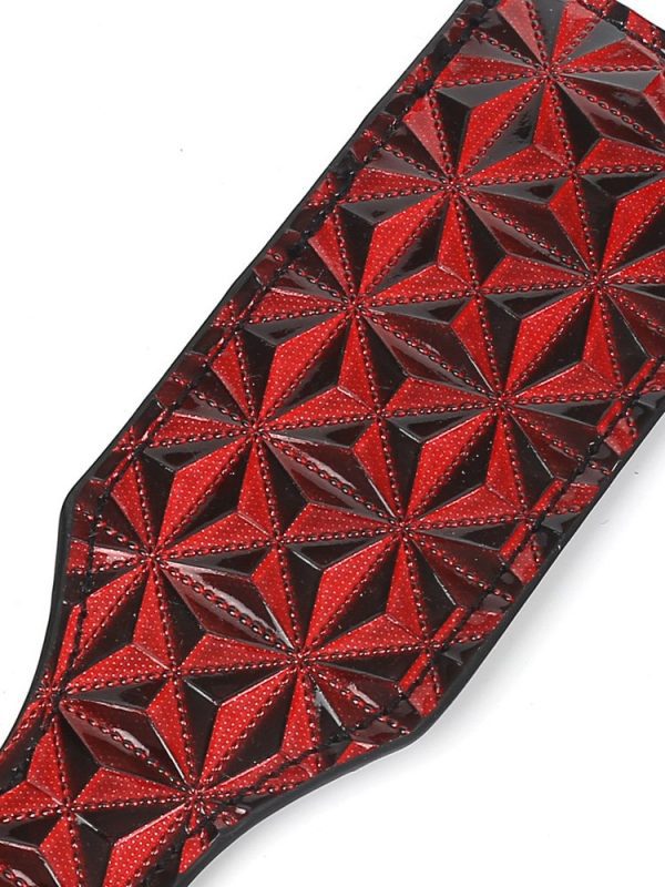 A stylish hand clap featuring a diamond pattern, designed to add elegance and flair to your playtime