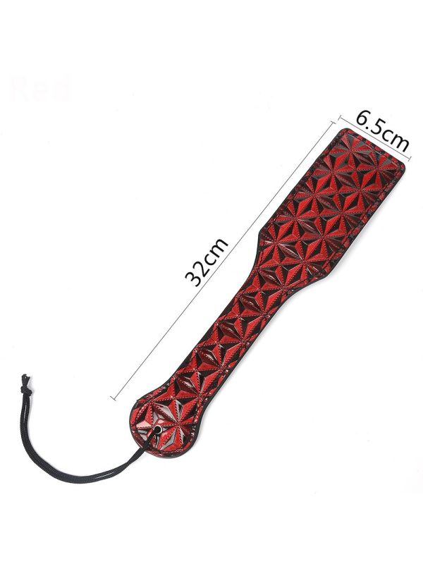 A stylish hand clap featuring a diamond pattern, designed to add elegance and flair to your playtime