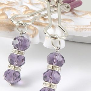 Elegant nipple clip adorned with a sparkling pendant, showcasing a blend of luxury and sensuality