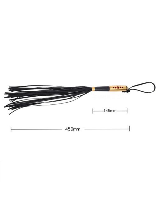 A whip featuring a gold handle, designed for both style and performance in your intimate play