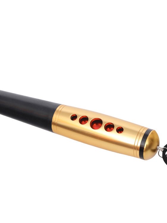 A whip featuring a gold handle, designed for both style and performance in your intimate play