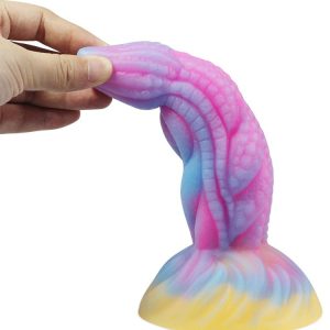 Pink dragon-shaped silicone dildo with intricate design and smooth texture