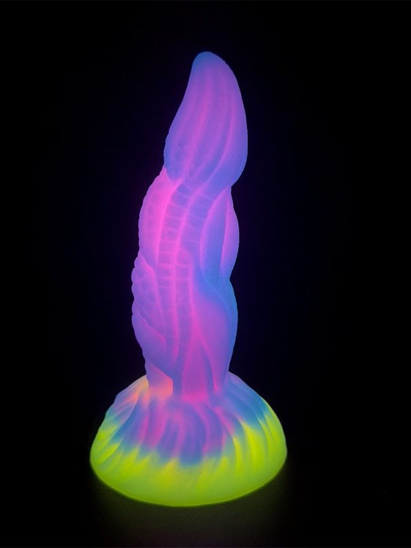 Pink dragon-shaped silicone dildo with intricate design and smooth texture
