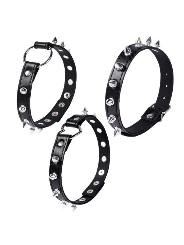 A black collar adorned with metal studs, showcasing a bold and edgy design