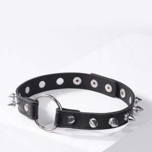 A black collar adorned with metal studs, showcasing a bold and edgy design