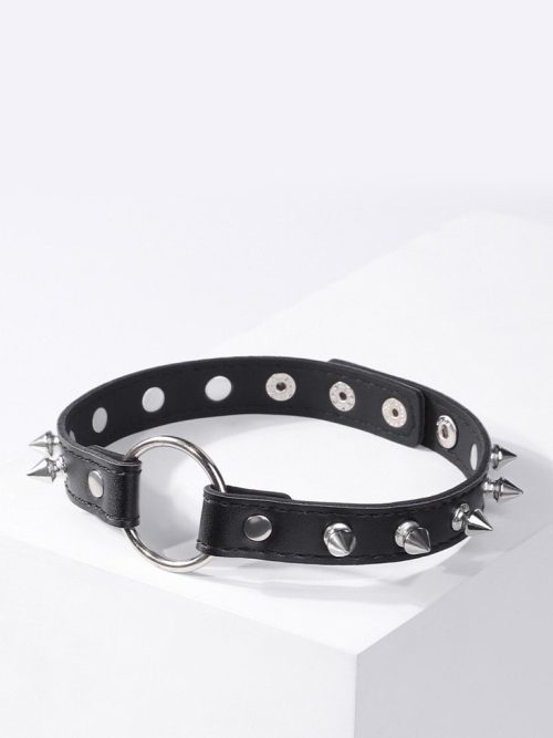 A black collar adorned with metal studs, showcasing a bold and edgy design